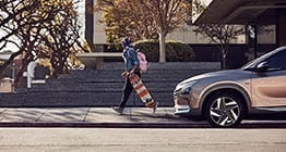 nexo 2019 side view with man